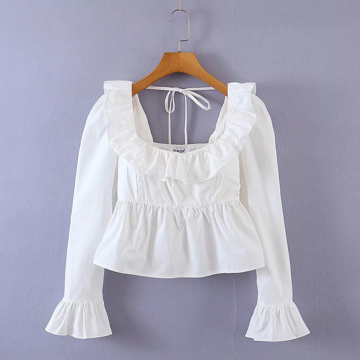 Summer Wind Bella Mia long sleeve ruffled shirt for women, solid color tops with a stylish, flowing design.