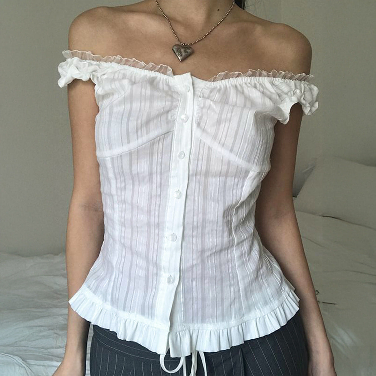 Women’s Bella Mia sleeveless cold shoulder summer top with a sexy, lightweight cardigan style shirt.