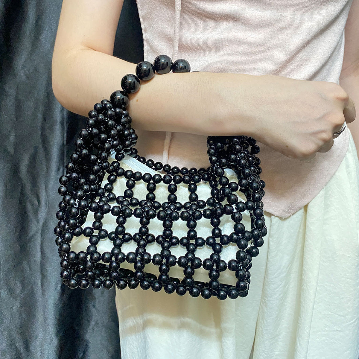 High Sense Minority Simple Elegant Hollow Out Cutout Handmade Beaded Dumpling Bag Retro Woven Handbag Bella Mia