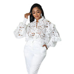 Women’s Bella Mia lace-up cardigan with hollow out cutouts, lantern sleeves, and flounce trim, styled as stylish outerwear.