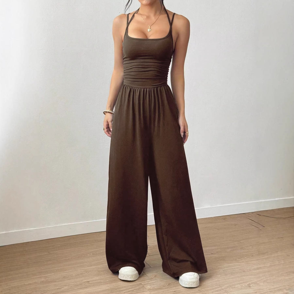 Casual women's summer jumpsuit by Plush Fashion Hub featuring wide-leg, loose fit, wrapped chest, and nipped waist.