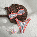 Bella Mia printed strap bikini two-piece swimsuit with ring details, perfect for beach and seaside spring swimming.