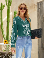 Women’s ethnic print v-neck long sleeve top by Bella Mia, casual stylish shirt with vibrant pattern and comfortable fit.