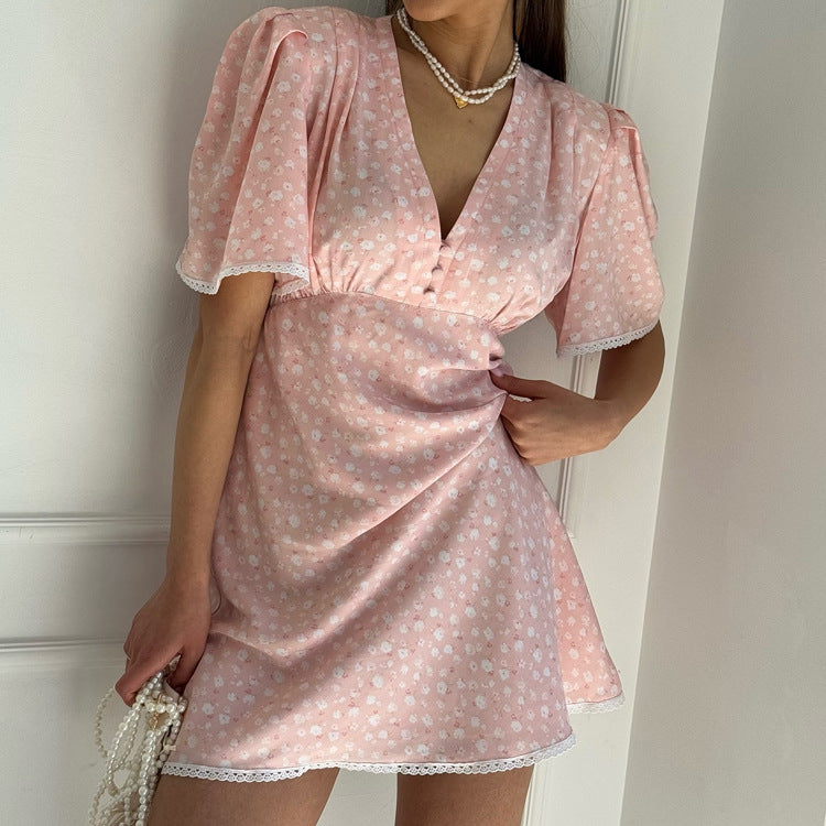 Women’s floral summer dress by Plush Fashion Hub, casual V-neck short sleeve high waist dress with a floral pattern.