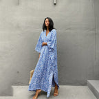 Printed long beach cover-up dress by Plush Fashion Hub, featuring a maxi style, sun protection fabric, perfect for vacation and swimwear.