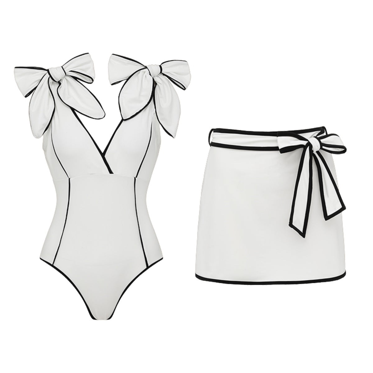Black and white matching swimsuit bottoms with a bow, featuring a white skirt, designed for women by Plush Fashion Hub.