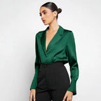 Elegant satin faux silk long sleeve shirt for women, minimalist spring summer top by Bella Mia, shown on a hanger.