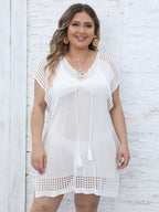 Women’s Bella Mia deep V plunge lace-up beach dress, stylish vacation cover-up with flowy fabric and lace details.
