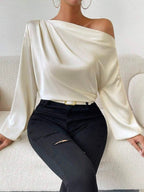 Bella Mia women's satin long sleeve shirt with oblique shoulder design and asymmetric pullover style in solid color.