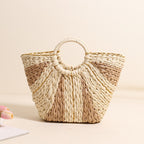 Large capacity straw-weaved Bella Mia bag with contrast color handles, ideal for beach, vacation, or vegetable shopping.