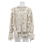 Bella Mia women's French design ruffled tied printed top with round neck and flared sleeves, ideal for office or casual wear.