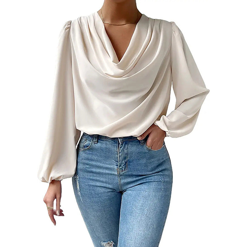 Loose draped V-neck long-sleeved shirt for women by Bella Mia, stylish top with relaxed fit and soft fabric.
