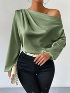 Women's Bella Mia long sleeve satin top with oblique shoulder design, asymmetric fit, solid color, and elegant pullover style.