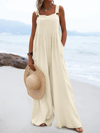 Women’s summer ethnic wide-leg jumpsuit by Bella Mia featuring solid color fabric and a relaxed fit.