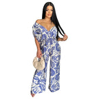 Women’s off-shoulder batwing sleeve wide-leg printed jumpsuit by Bella Mia, featuring a relaxed fit and stylish floral pattern.