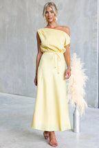 Plush Fashion Hub summer off-the-shoulder cocktail dress in solid color with sloping shoulder and tied waist, perfect for warm weather.
