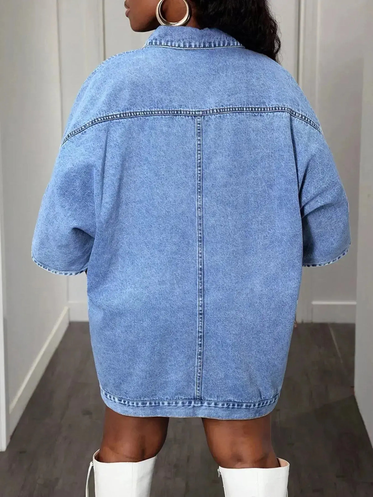 Women's oversized denim button-down shirt with batwing sleeves from Plush Fashion Hub, casual and trendy for everyday wear.