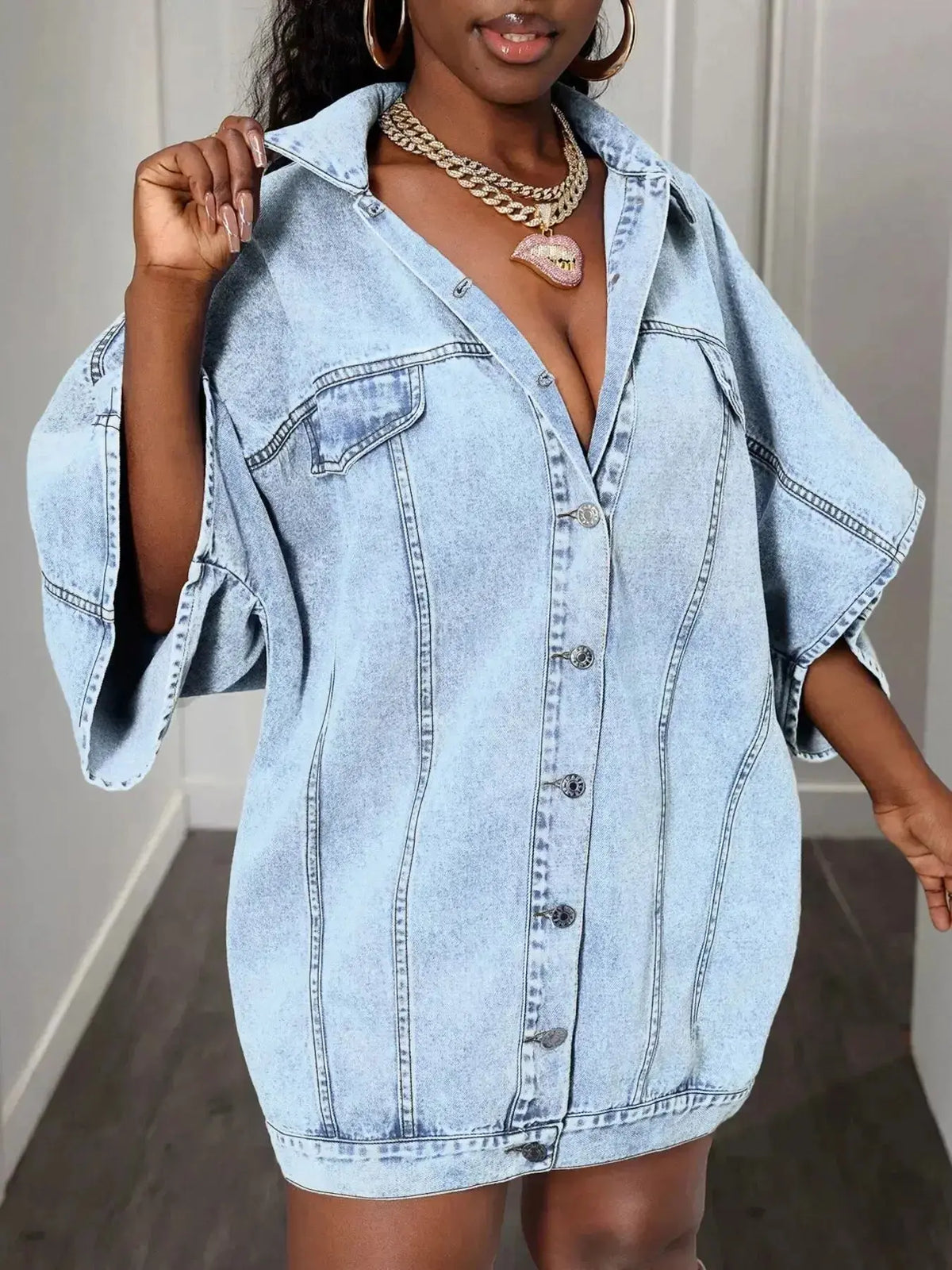 Women’s oversized denim button-down shirt with batwing sleeves by Plush Fashion Hub, casual and trendy for everyday wear.