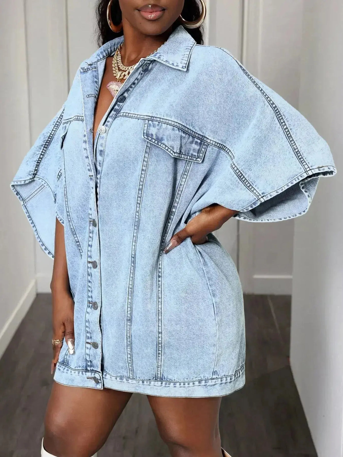 Women’s oversized denim button-down shirt with batwing sleeves by Plush Fashion Hub, casual and trendy women's shirt.