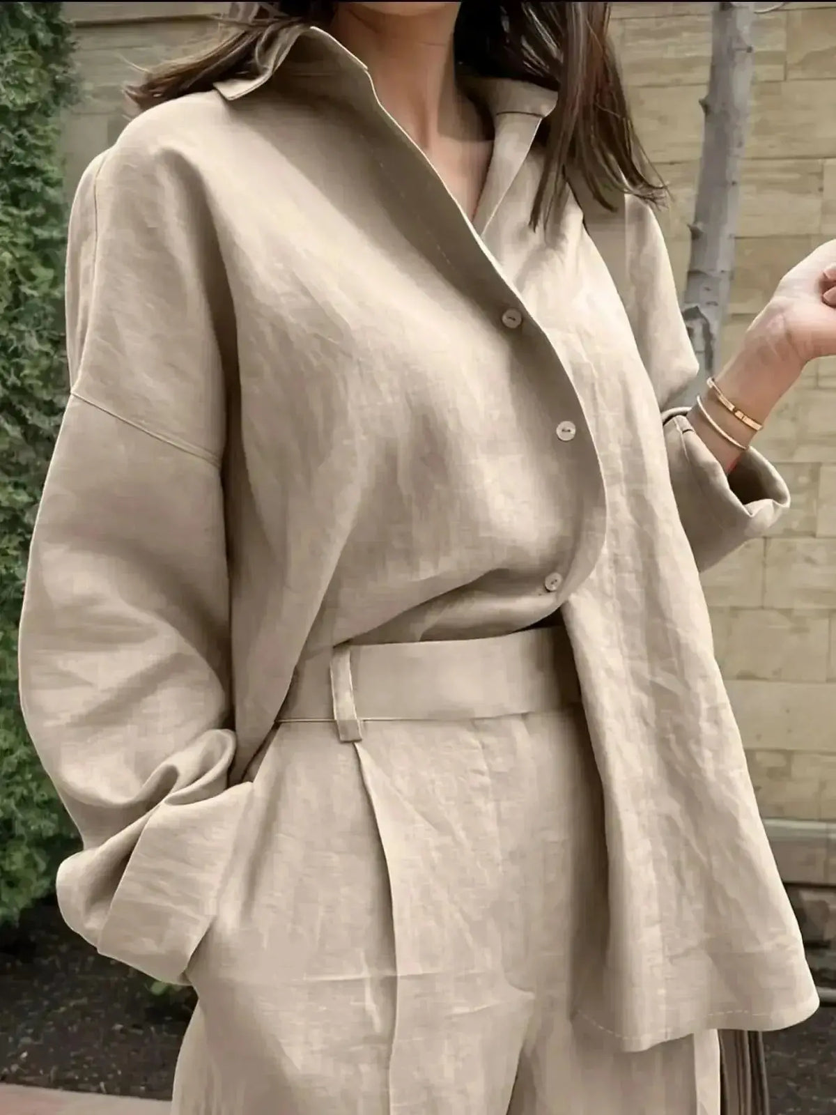Women's oversized long sleeve button-down shirt by Plush Fashion Hub, relaxed casual chic style, shown in a stylish casual outfit.