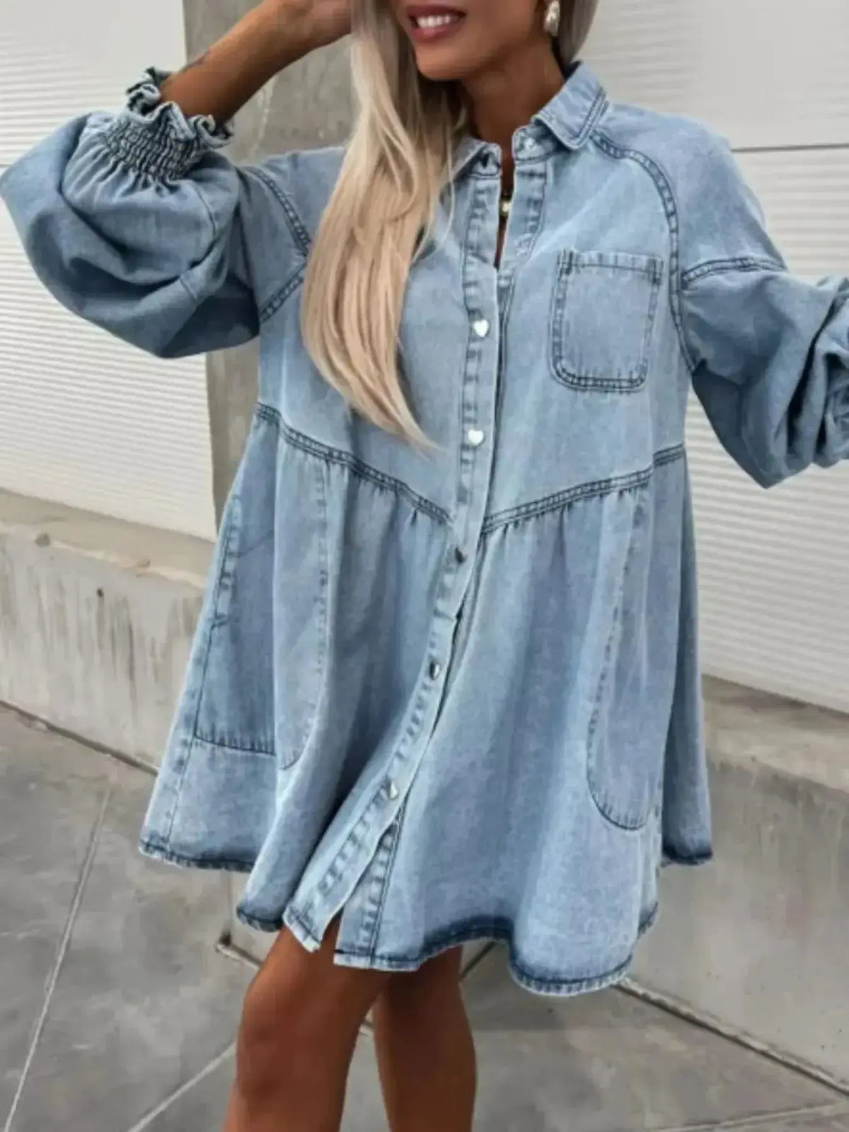 Oversized long sleeve denim button-up dress by Plush Fashion Hub featuring a casual, relaxed fit and classic denim texture.