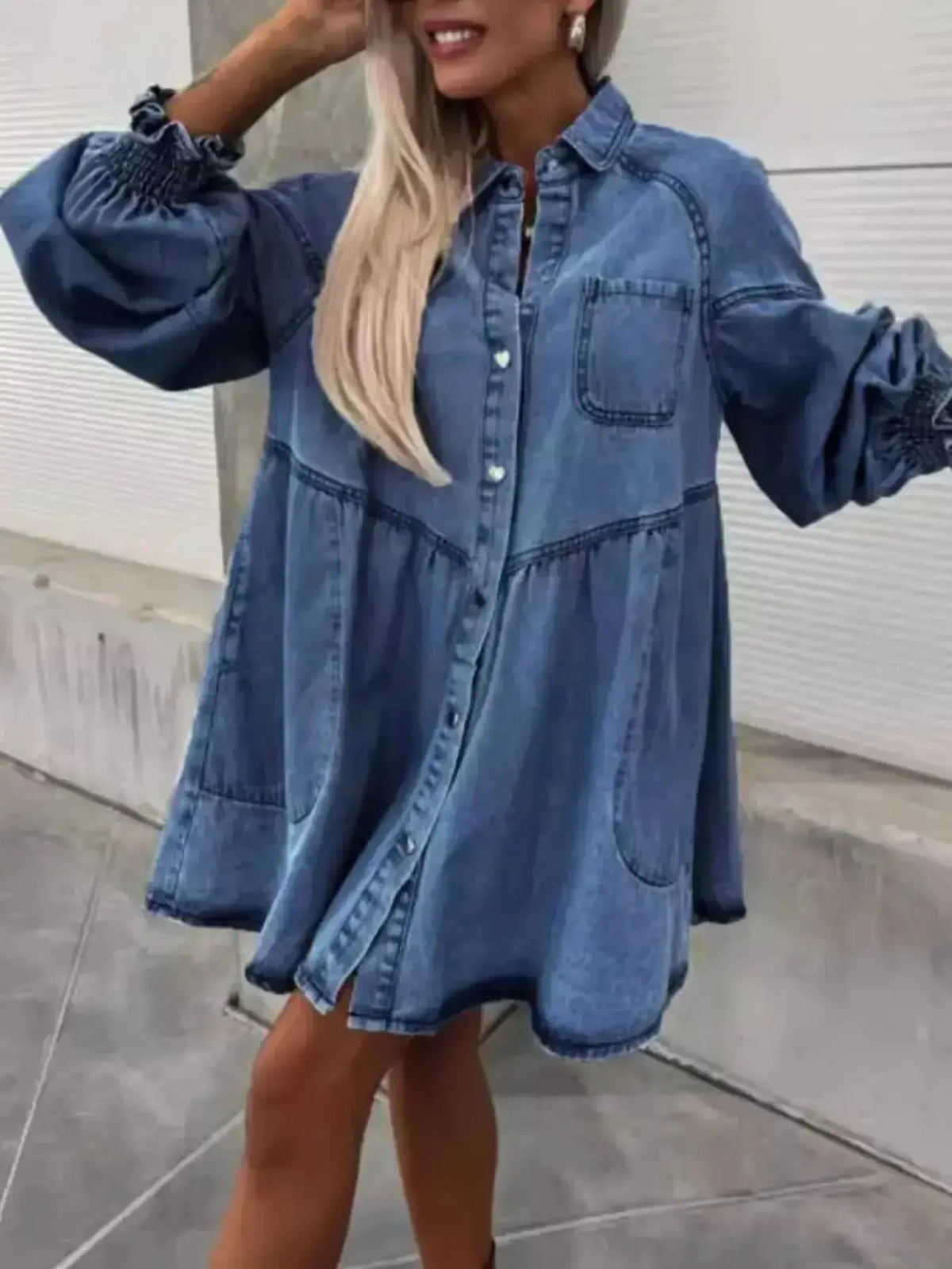 Oversized long sleeve denim button-up dress by Plush Fashion Hub, casual style with front pockets and relaxed fit.