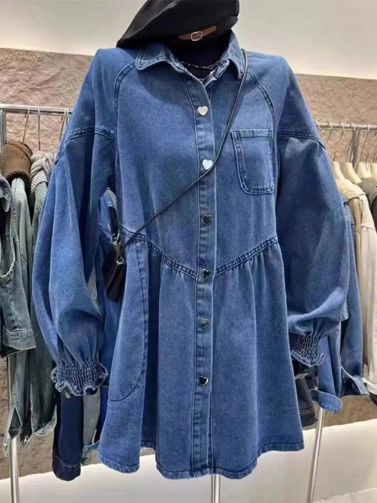 Oversized long sleeve button-up denim dress by Plush Fashion Hub, featuring classic denim fabric and relaxed fit style.