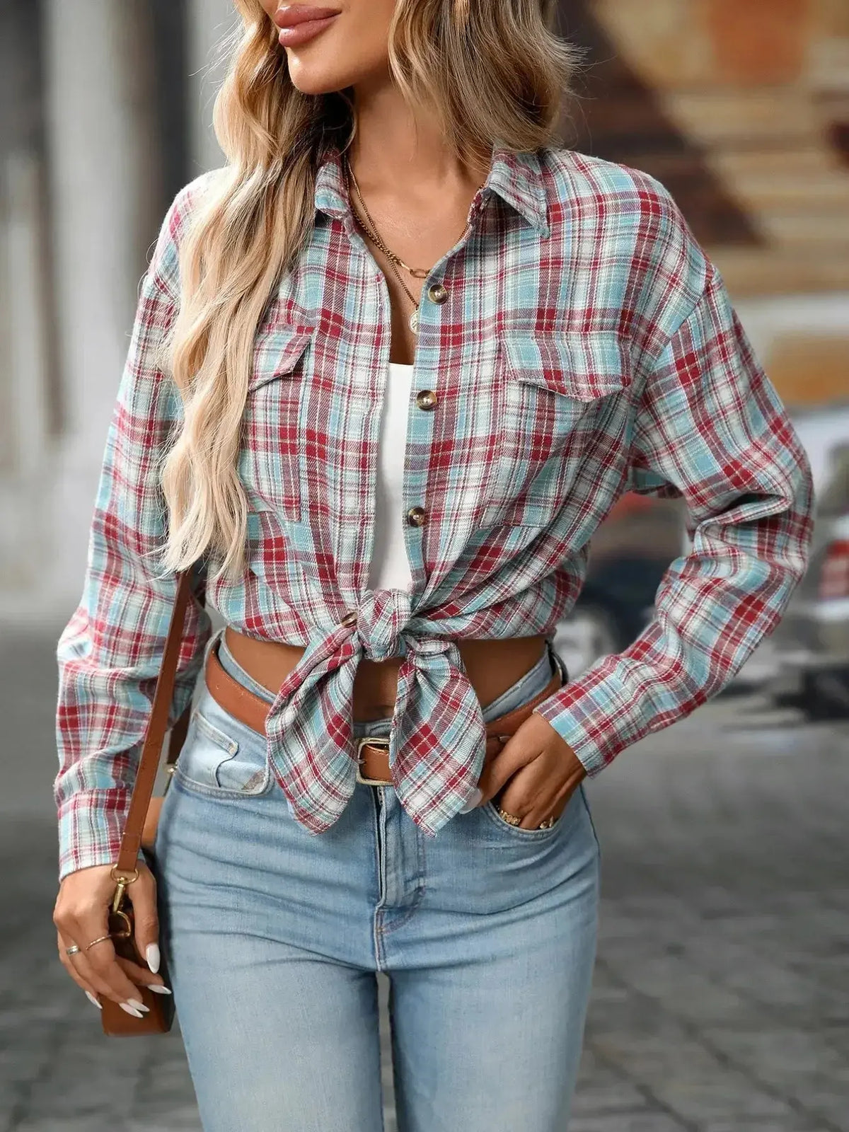 Oversized plaid flannel button-down shirt for women by Plush Fashion Hub, featuring soft casual fabric and classic checkered pattern.