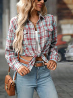 Oversized women's plaid button-down shirt by Trendsi featuring soft flannel fabric and casual relaxed fit.