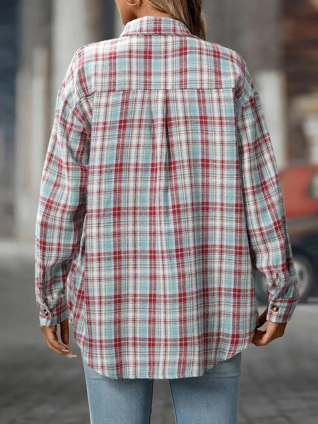 Oversized women's plaid button-down shirt by Trendsi, soft casual flannel top with a relaxed fit and classic plaid pattern.
