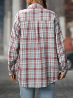 Oversized women's plaid button-down shirt by Trendsi, soft casual flannel top with a relaxed fit and classic plaid pattern.