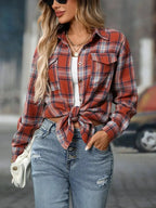 Oversized women's plaid button-down shirt by Trendsi, soft casual flannel top with a relaxed fit and classic plaid pattern.