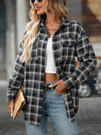 Oversized women's plaid button-down shirt by Trendsi, soft casual flannel top with a relaxed fit and classic plaid pattern.