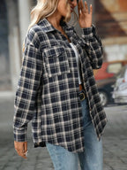Soft oversized plaid button-down shirt for women, casual flannel top by Trendsi, shown in a relaxed fit and classic plaid pattern.