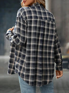Oversized women's plaid button-down flannel shirt with soft casual fit, featuring a relaxed style and classic pattern.
