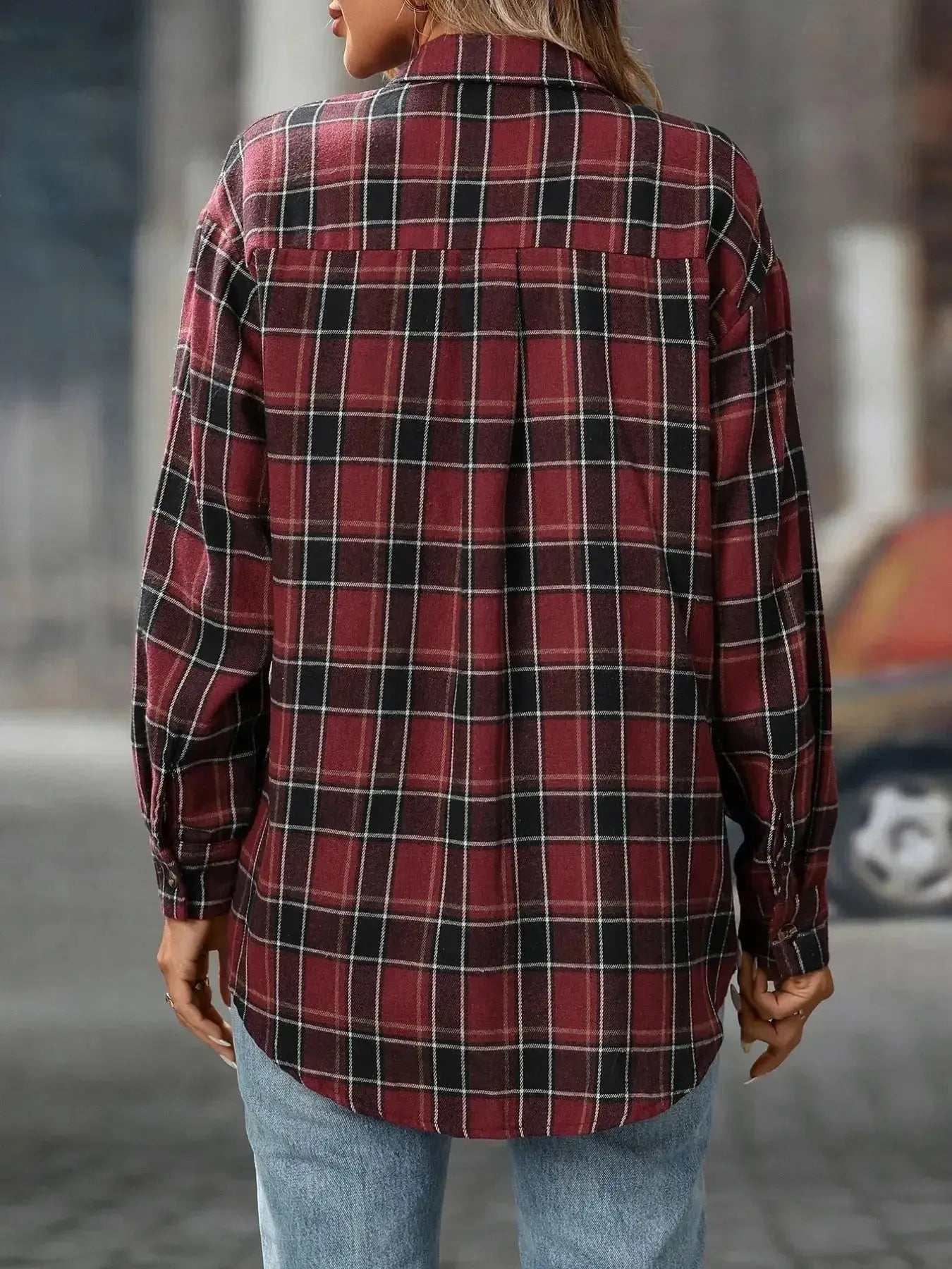 Oversized plaid button-down shirt for women by Trendsi, soft casual flannel top with classic checkered pattern and relaxed fit.
