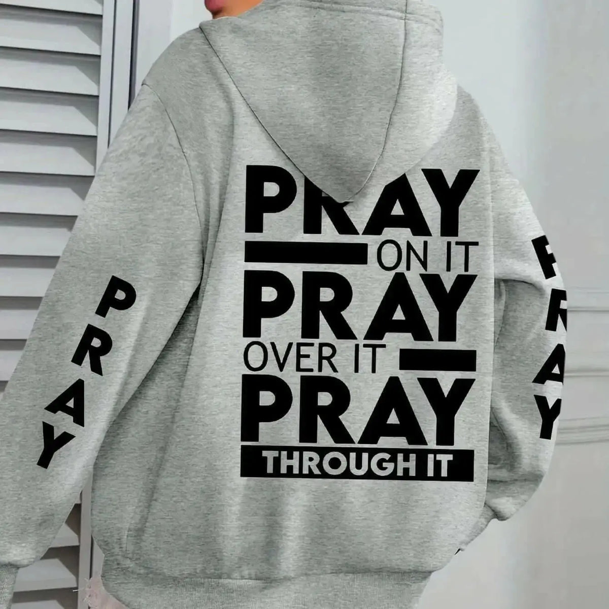 Women's plus size pray print kangaroo pocket hoodie by Plush Fashion Hub, cozy casual pullover with faith-themed design.