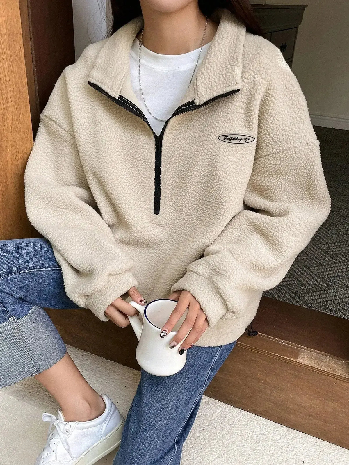 Women's half zip fleece sweatshirt with patch details and drop shoulder design by Plush Fashion Hub.