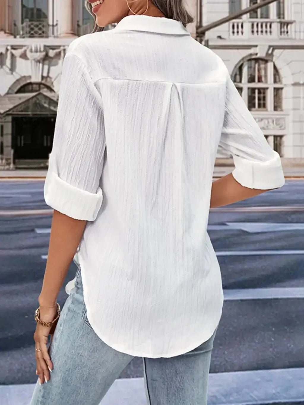 Plush Fashion Hub Perfee collared twisted front half-sleeve shirt for women, stylish casual top with a unique twist design.