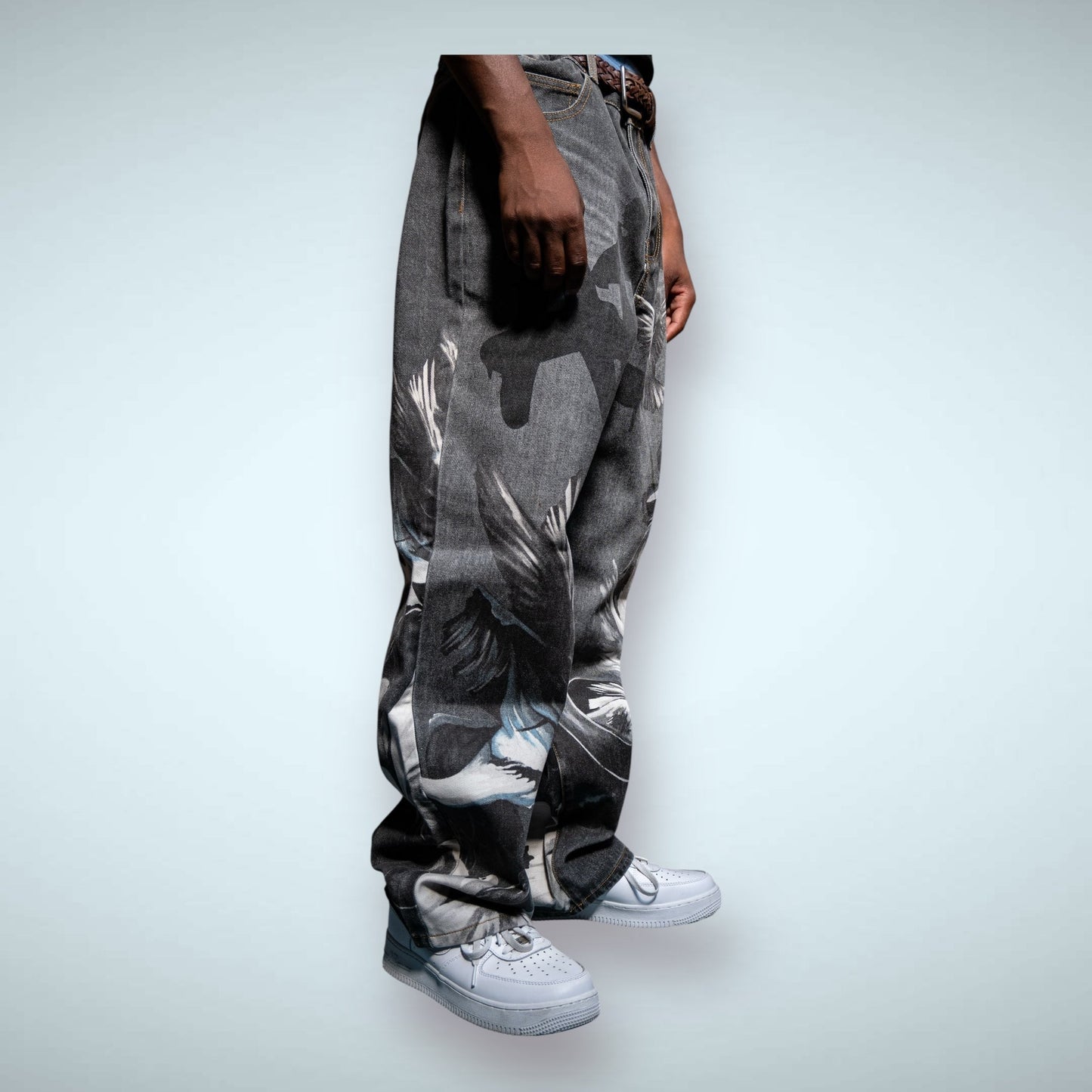 Graphic printed baggy jeans from Plush Fashion Hub with bold, colorful designs and relaxed fit, showcased on a model.