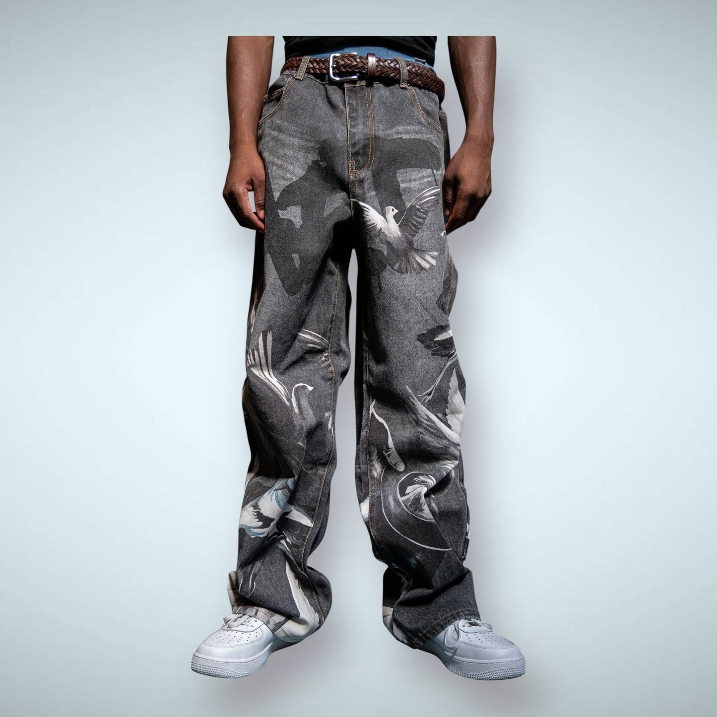 Graphic printed baggy jeans by Plush Fashion Hub featuring a relaxed fit and bold, artistic print on denim.
