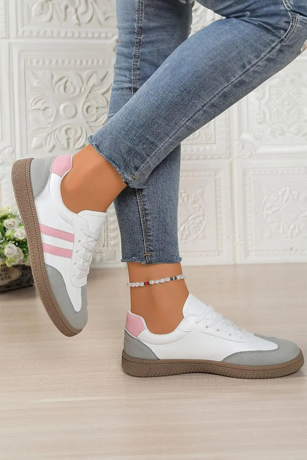 Women’s pink striped patchwork PU leather lace-up sneakers with a stylish, trendy design and comfortable fit from Plush Fashion Hub.
