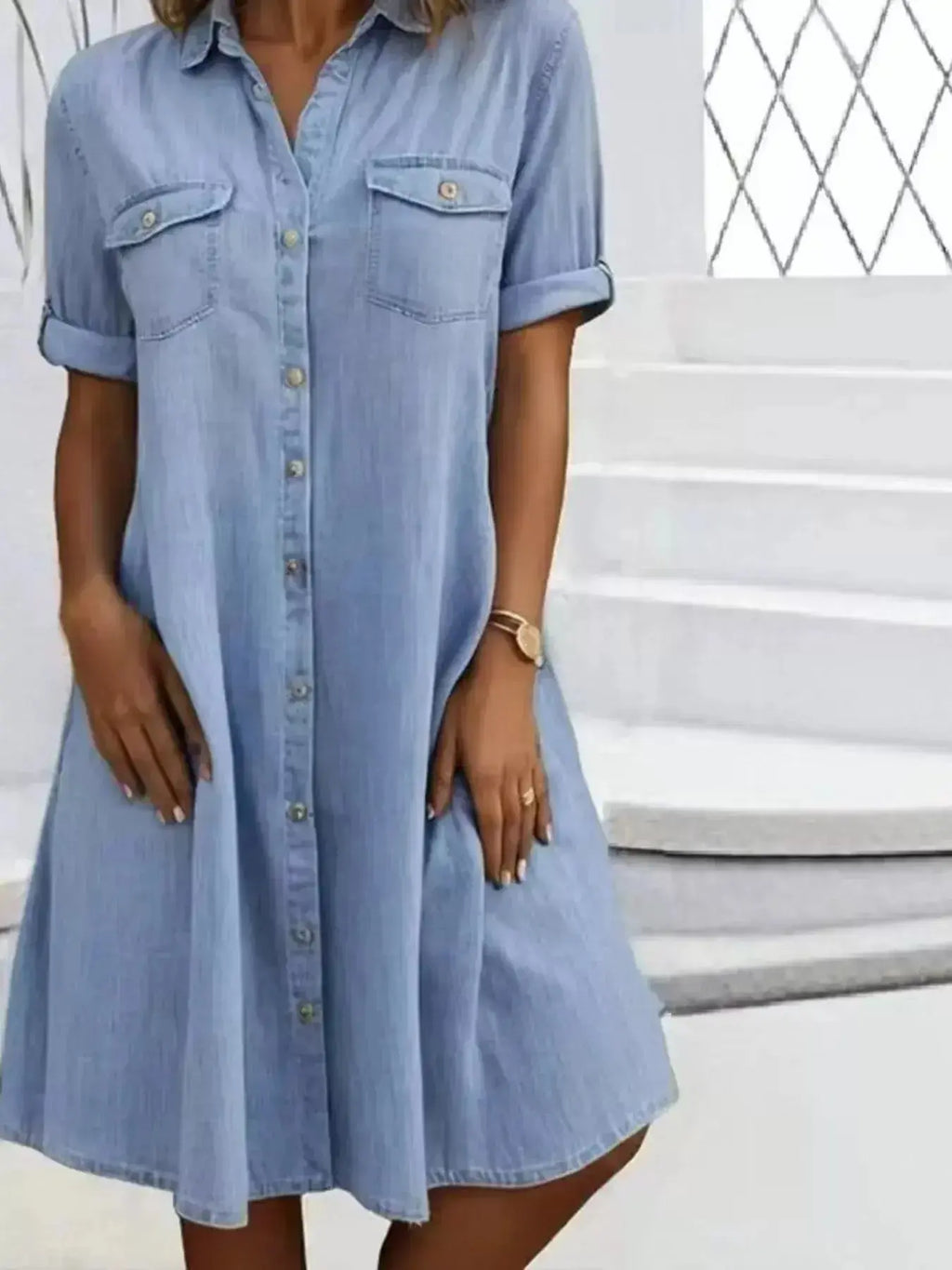 Plus size button-front short sleeve denim dress by Trendsi, casual midi style, featuring a flattering fit and classic denim fabric.