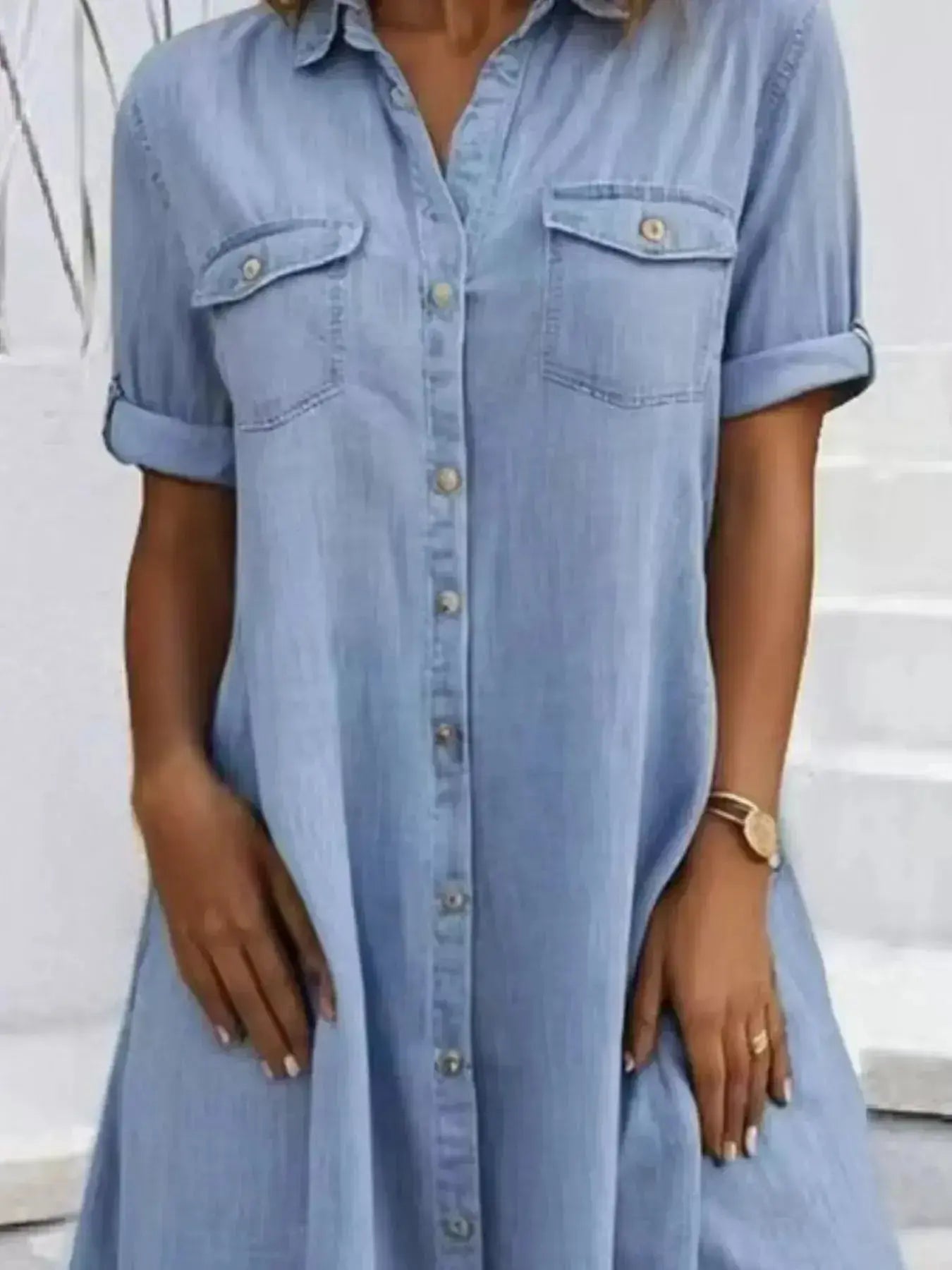 Plus size button-front short sleeve denim dress by Trendsi, casual midi style with flattering fit, denim fabric, and front button details.