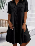 Plus size button-front short sleeve denim dress by Trendsi, casual midi style, featuring flattering fit and classic denim fabric.