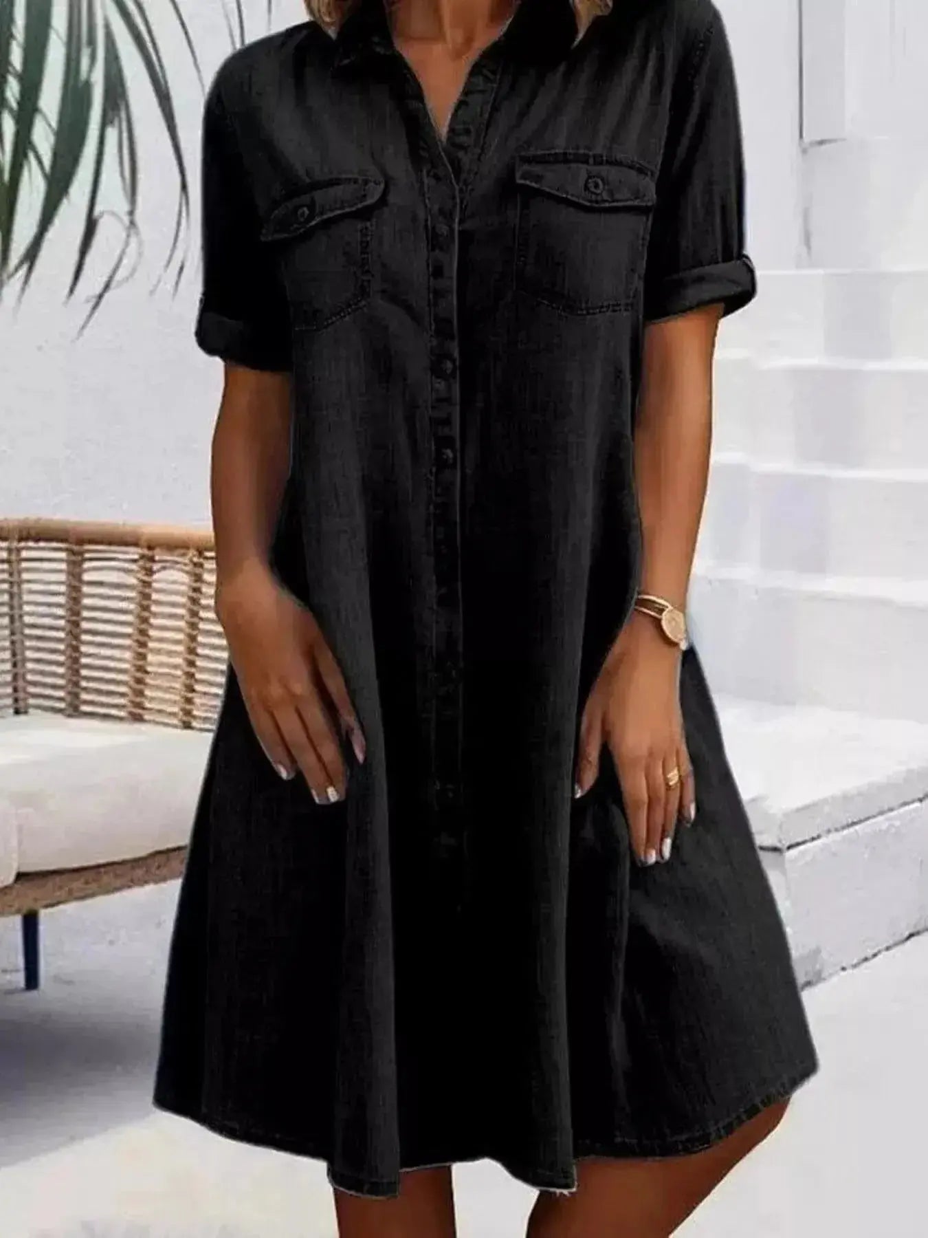 Plus size button-front short sleeve denim dress by Trendsi, casual midi style, featuring flattering fit and classic denim fabric.