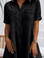 Plus size button-front short sleeve denim dress by Trendsi, featuring a flattering casual midi style with classic denim fabric.