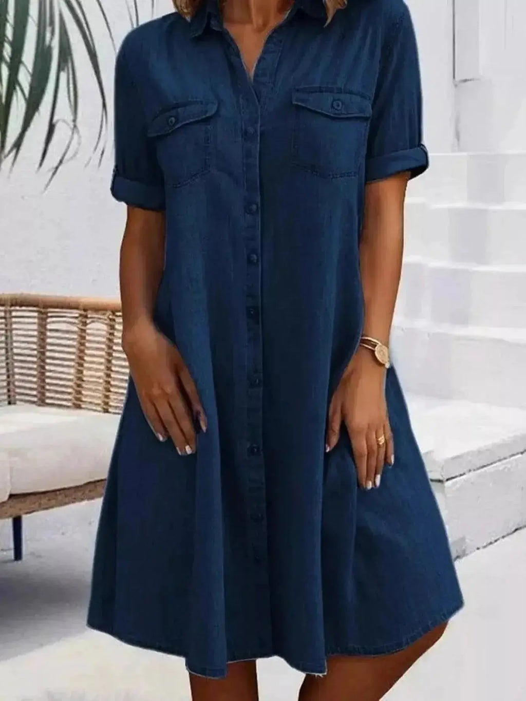 Plus size button-front short sleeve denim dress by Trendsi, casual midi style with flattering fit and classic denim look.