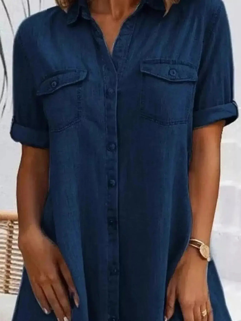 Plus size button-front short sleeve denim dress by Trendsi, casual midi style, made of durable denim fabric.