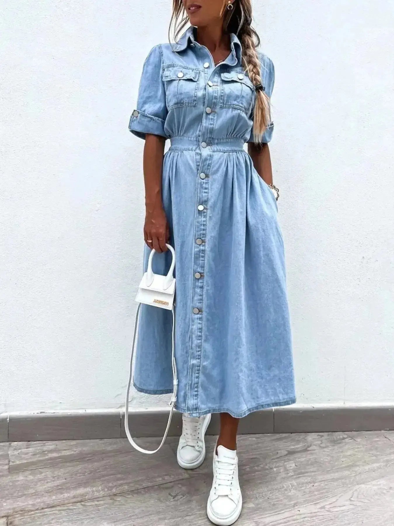 Plus size denim shirt dress with roll-up sleeves and front pockets, casual trendy denim fashion by Trendsi.